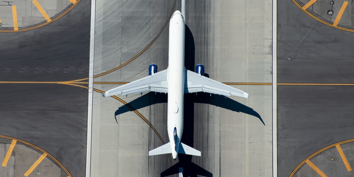 Birds eye view of aeroplane on runway